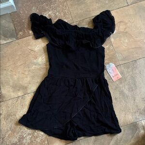 Justify Black Ruffled one piece dress with shorts connected.